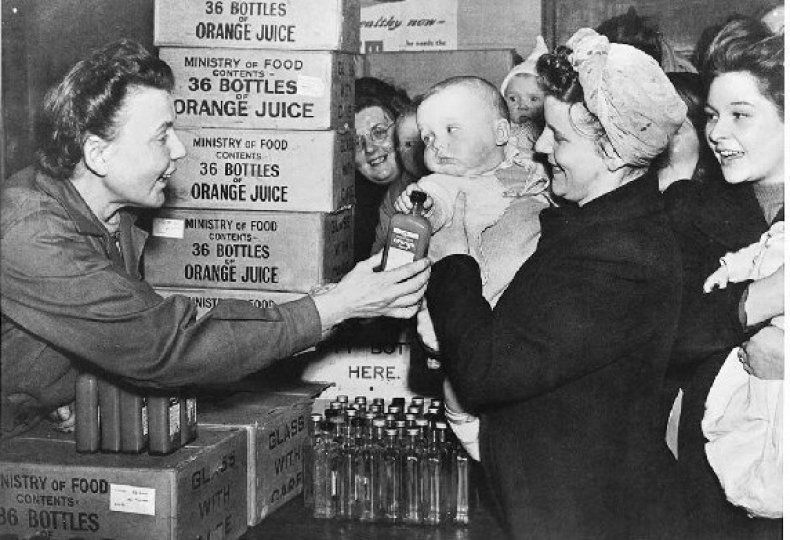 A distribution of orange juice to mothers