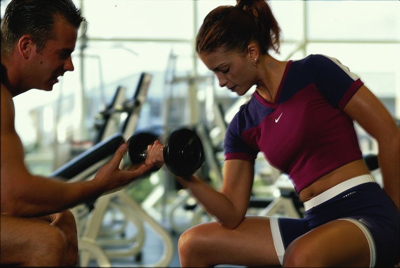 Woman and Personal Trainer