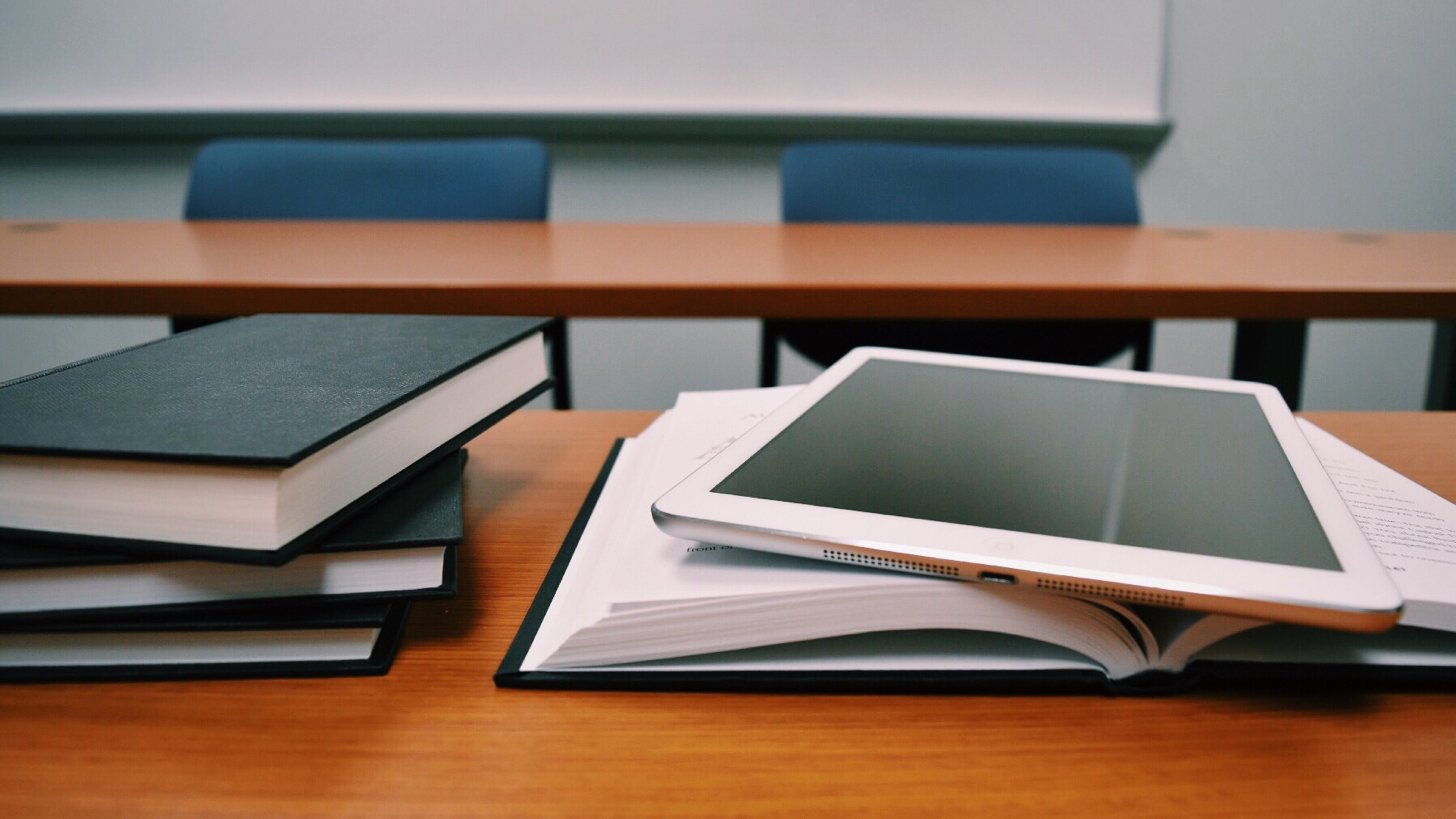 tablet and books in classroom