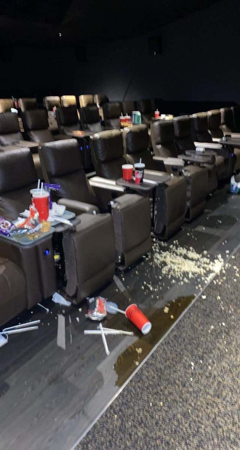 Movie theater covered in popcorn & soda