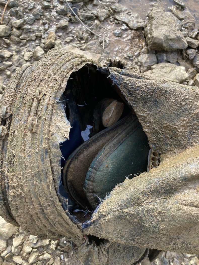Bag of weapons found in lake.