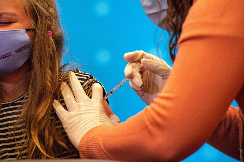 Child Receives COVID-19 Vaccine