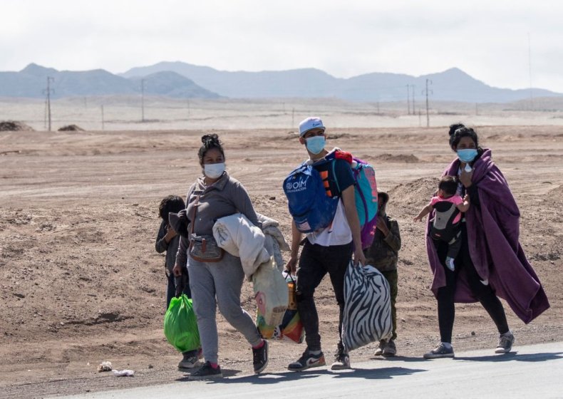 Venezuelan migrants walk