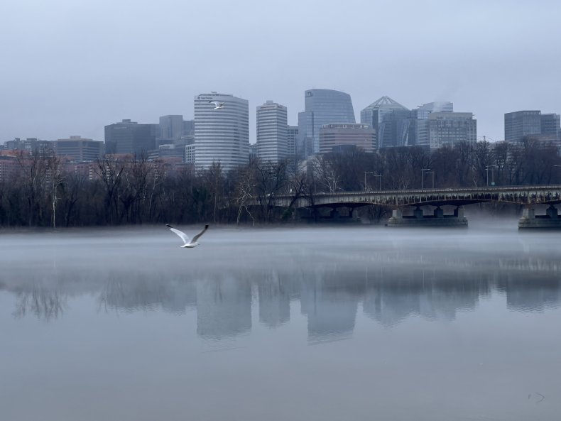 White fog rises over the Potomac river 