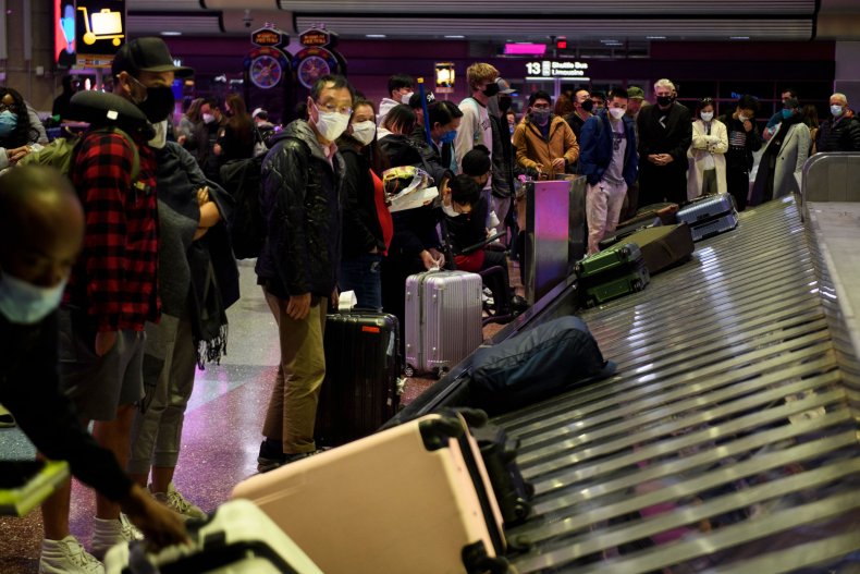 Air Travelers Wait For Bags