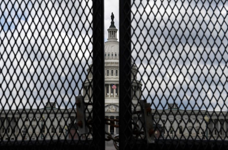 Capitol is seen behind fences