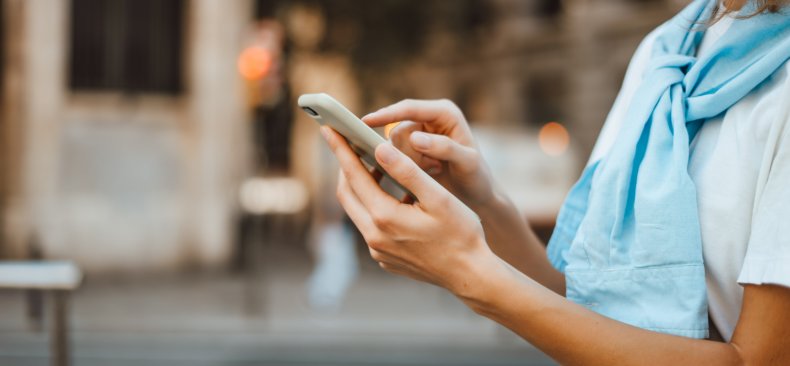 Female holding smartphone