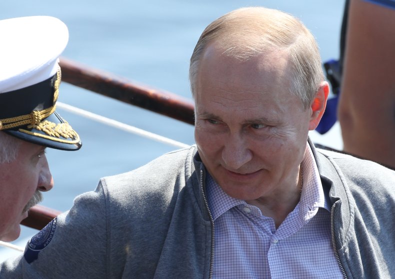 Vladimir Putin onboard a Russian navy vessel.