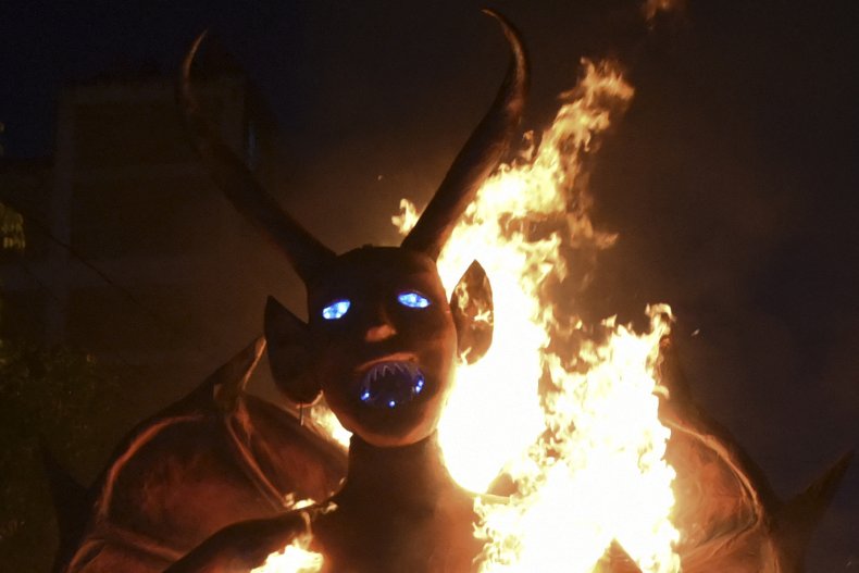 Photo of devil figure on fire