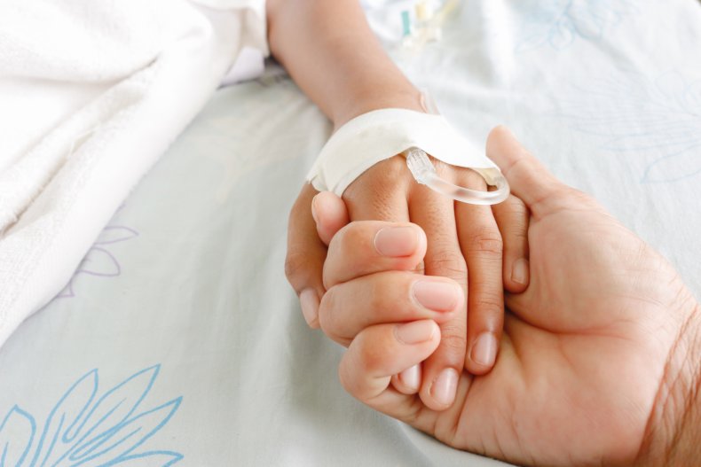 A child in a hospital bed