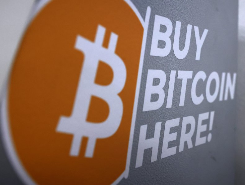 The Bitcoin logo is displayed on the 