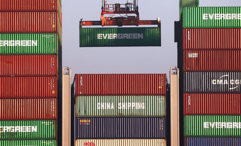A container is offloaded from a ship 