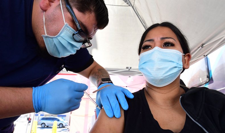 A person getting a COVID-19 vaccine shot.