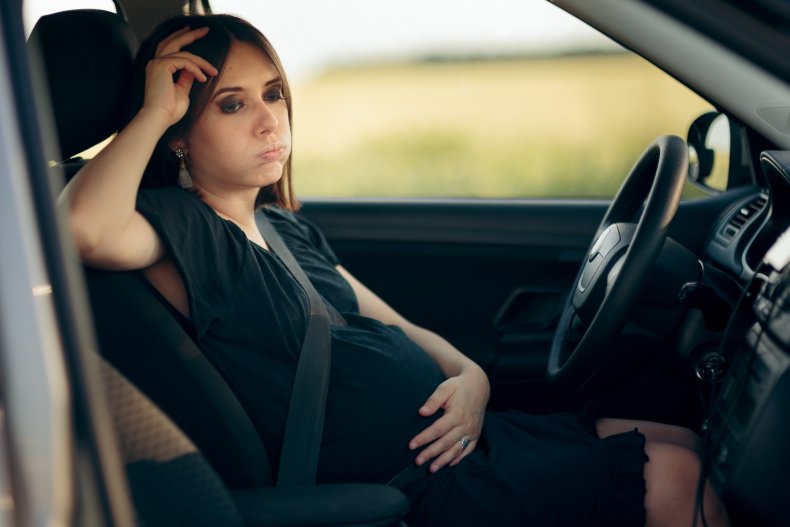 Pregnant woman kicked out of car