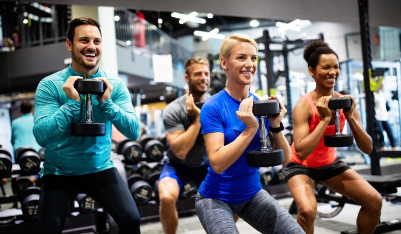 A group of people doing exercises using