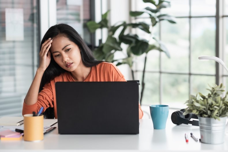 Woman upset with laptop