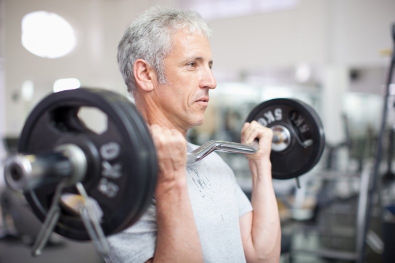 A man holding a barbell.