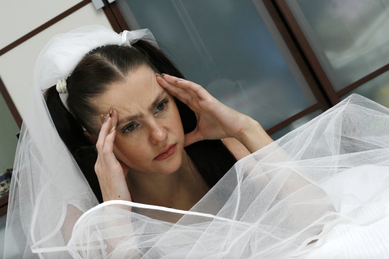 A bride looking unhappy.