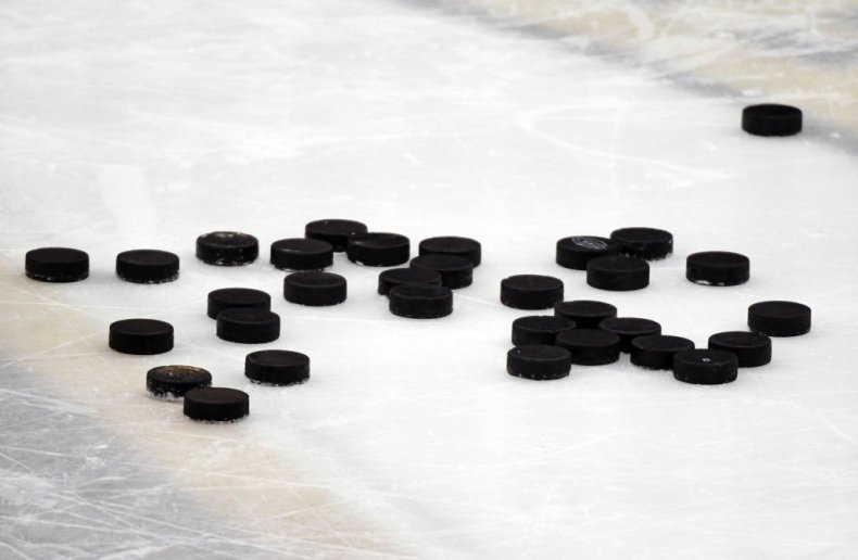 Hockey pucks on ice