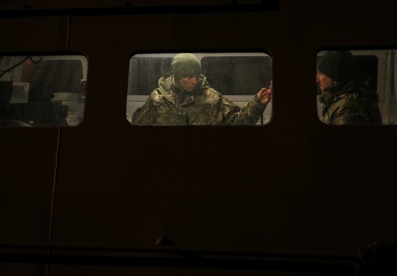 Ukrainian servicemen are seen inside a vessel 