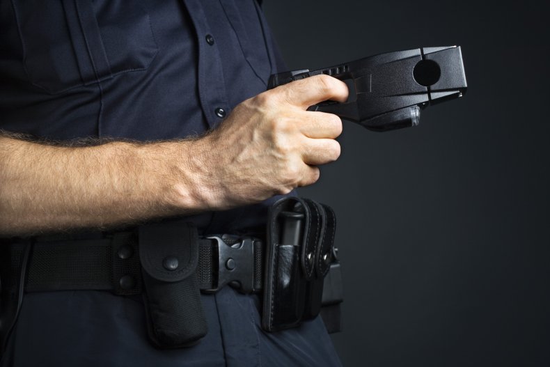 Officer holding stun gun