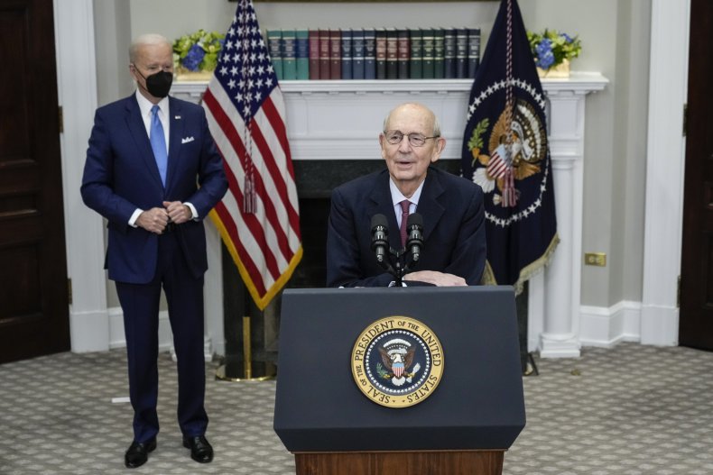 U.S. President Joe Biden looks on as
