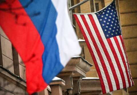 Russian flag flies next to U.S. flag
