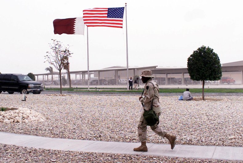 U.S. and Qatari flags