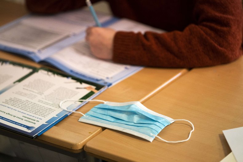 Mask on desk in classroom