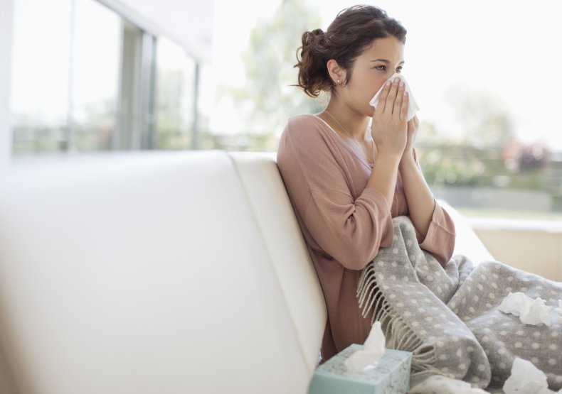 Stock image of flu sufferer