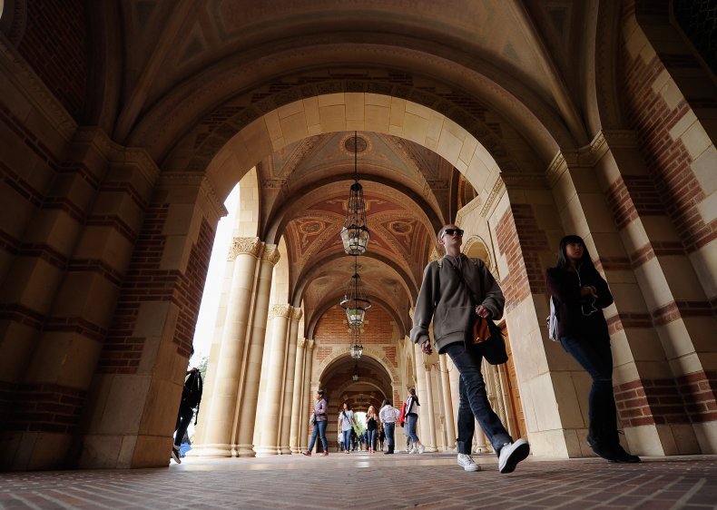 Students walk near Royce Hall at UCLA