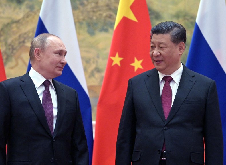 Putin and Xi Jinping  face each other