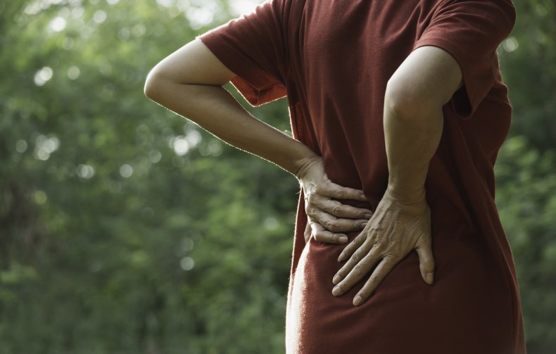 A woman with back pain