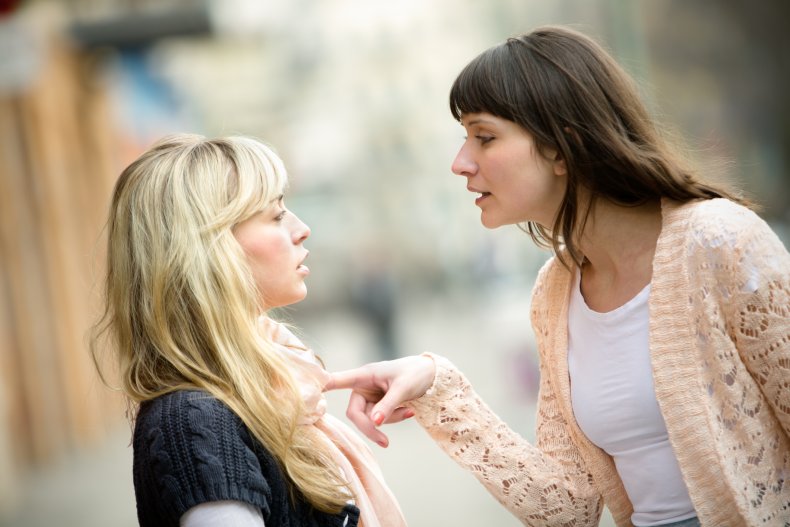 Two women arguing.