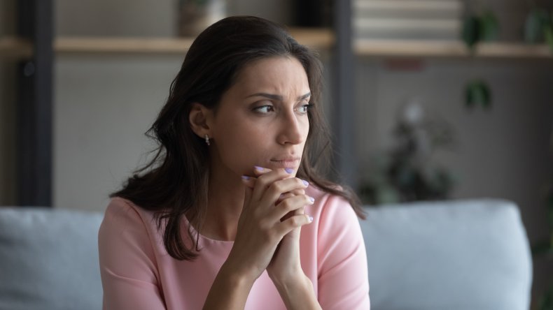 Woman looking unhappy and worried