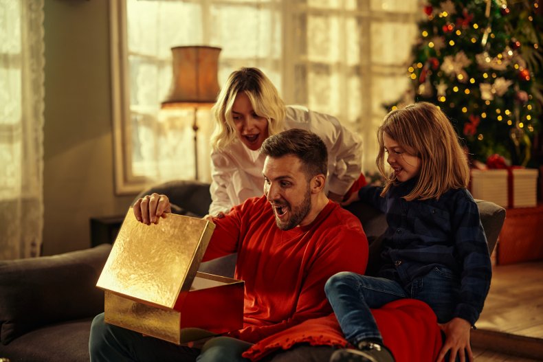 Dad opening Christmas present