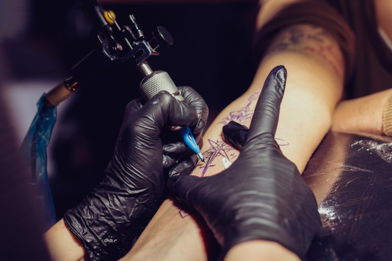 Person getting tattoo
