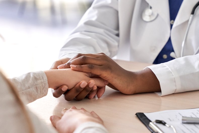 Doctor holding hand