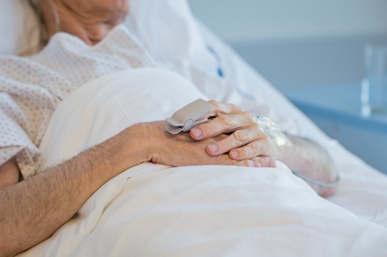 An elderly man in hospital