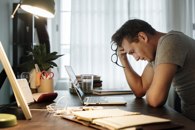 Man stressed at desk