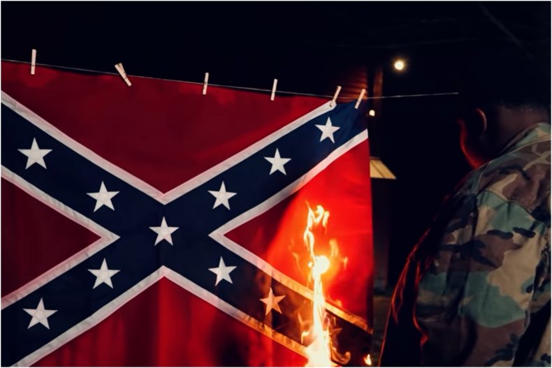 Gary Chambers Burns a Confederate Flag. 
