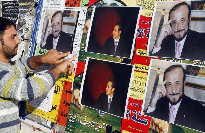 Alawite posters Rifaat al-Assad and Ribal al-Assad