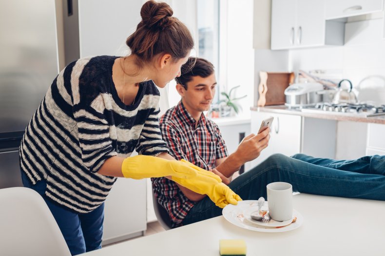 Woman cleaning up after boyfriend