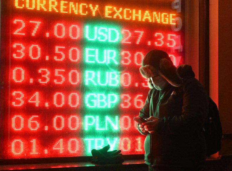 Ukraine man outside currency exchange Kyiv