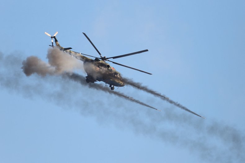 Russian helicopters fly into Ukraine 