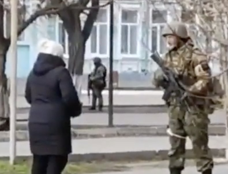 woman confronts Russian soldier