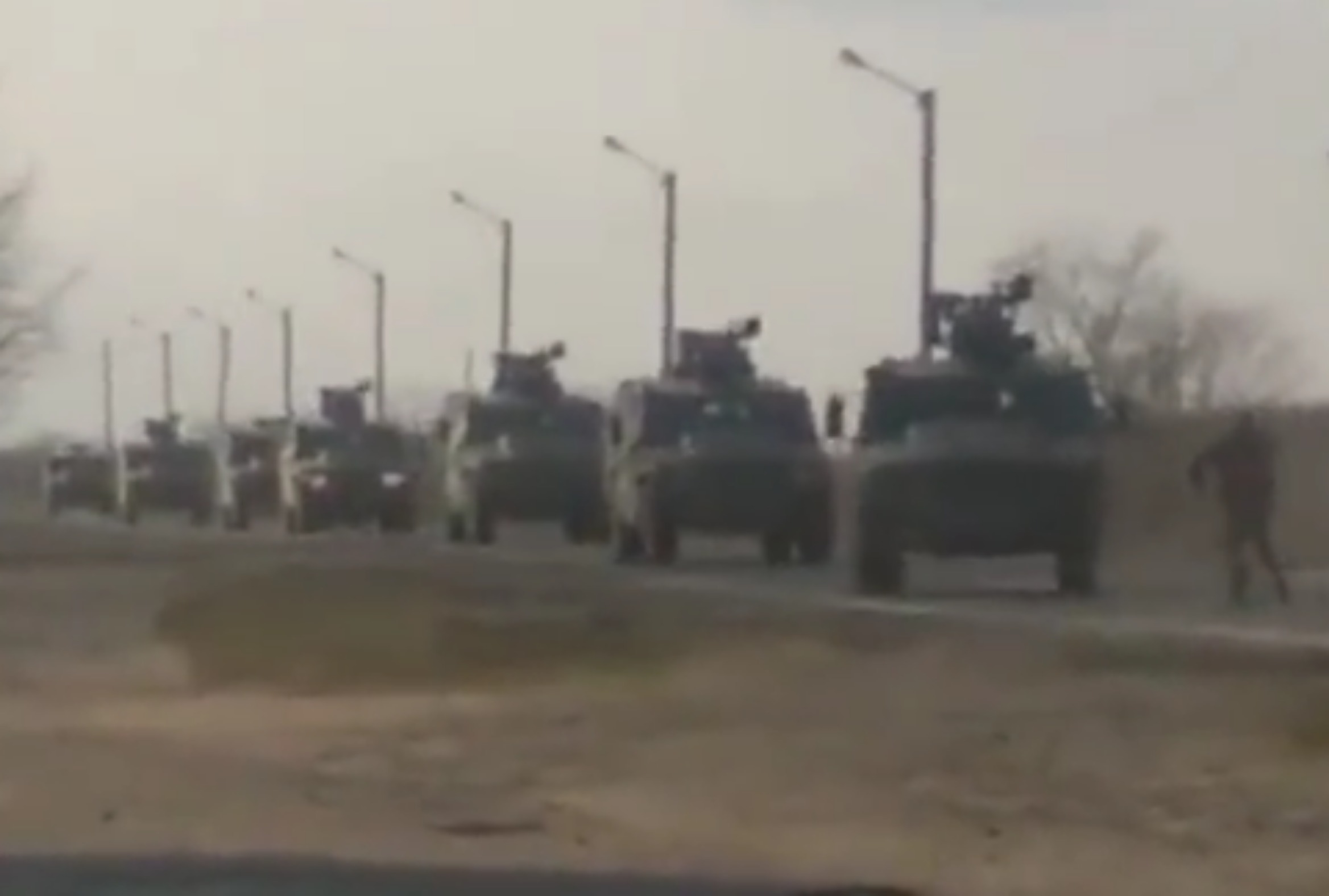 Ukrainian Stands in Front of Russian Military Convoy in Echo of Tiananmen Square