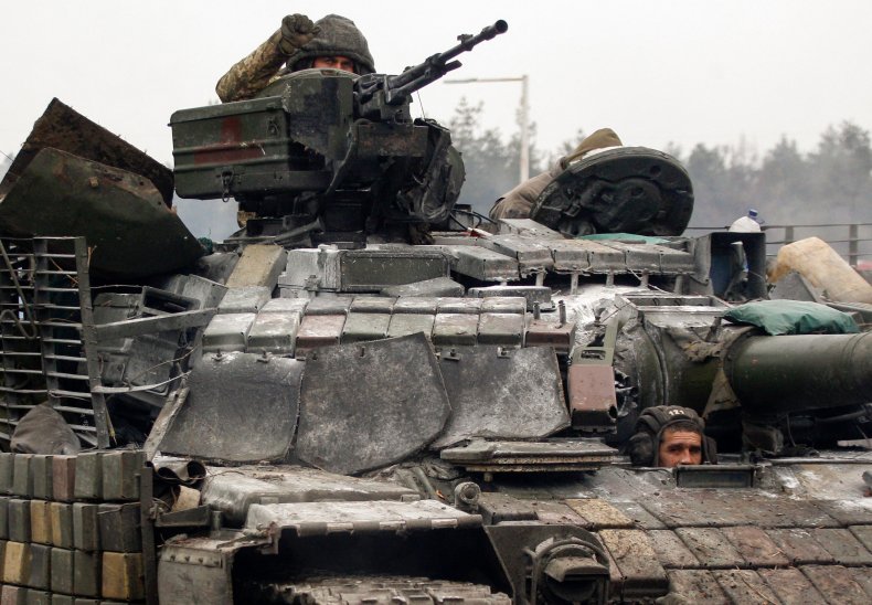 Ukrainian servicemen gesture