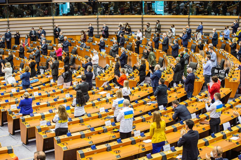 European Parliament members give a standing ovation 