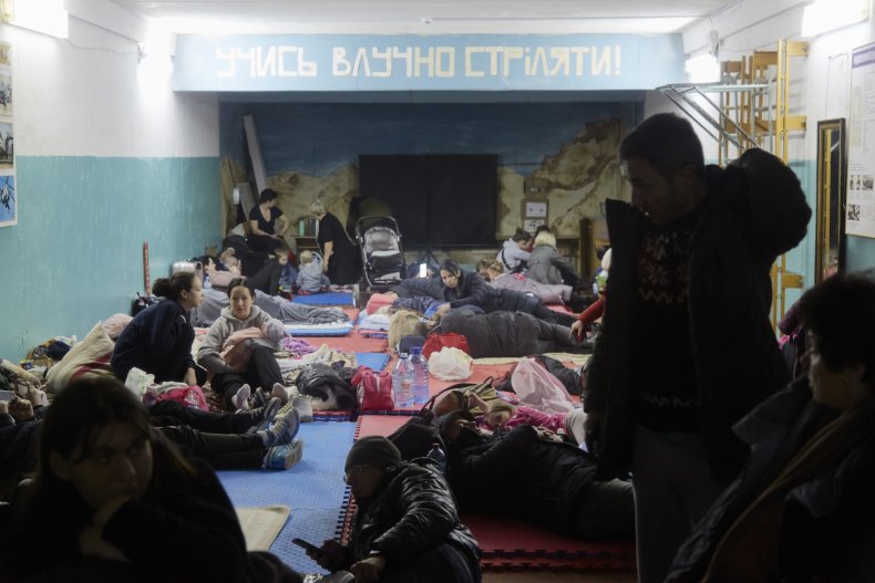 Residents gather in a bomb shelter